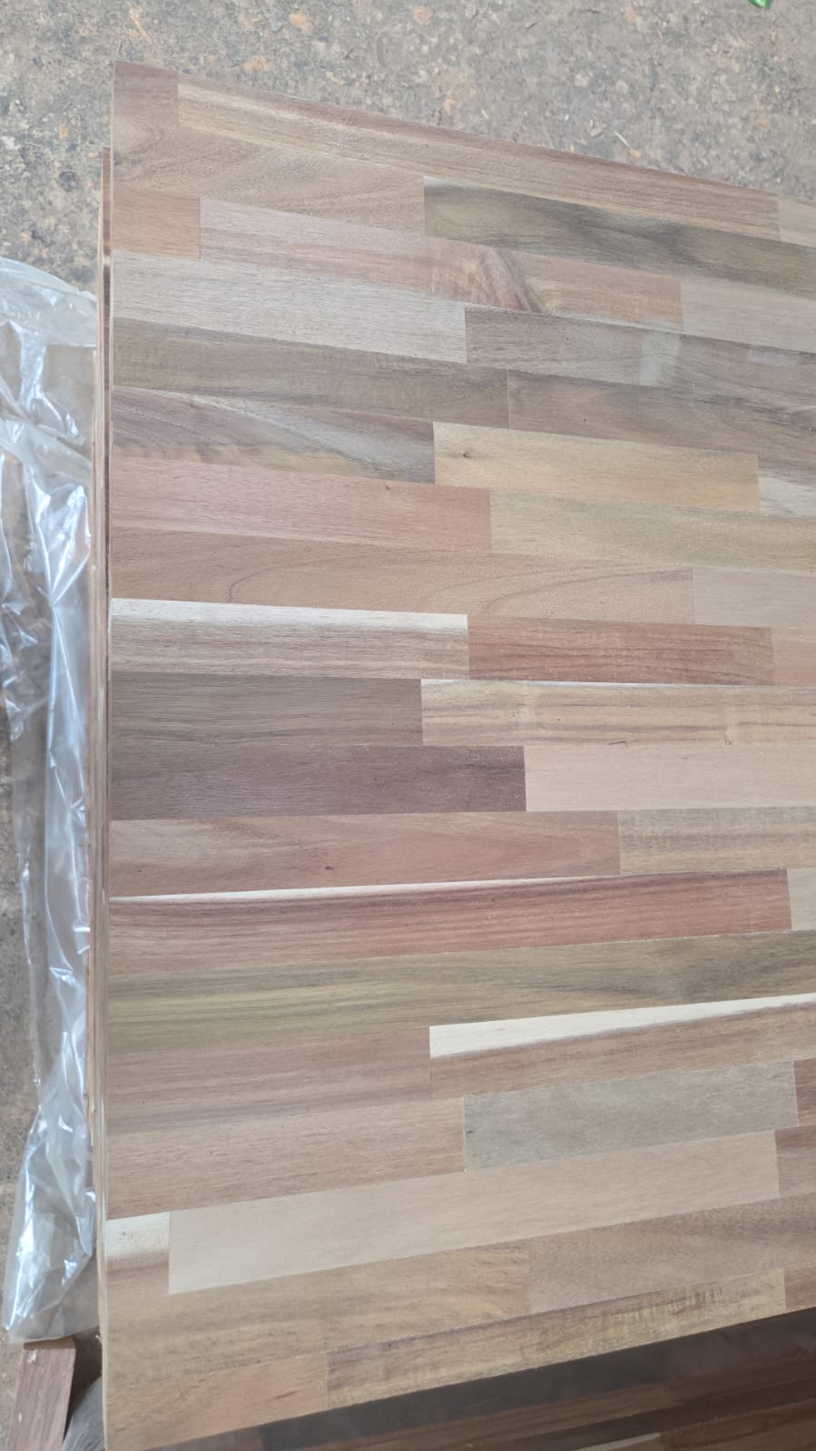 Unfinished butcher block panel showing natural grain variation